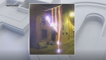 Police searching for person who allegedly set American flag on fire in Philly