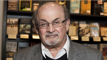 Salman Rushdie ‘on the road to recovery’ after stabbing at lecture in upstate New York, his agent says