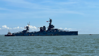Battleship Texas, which served in both world wars, towed from Houston to Galveston for repairs