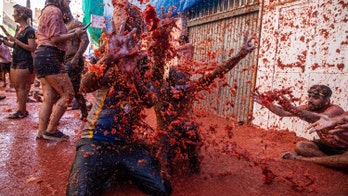 20,000 people threw truckloads of tomatoes at each other for an hour, a national tradition