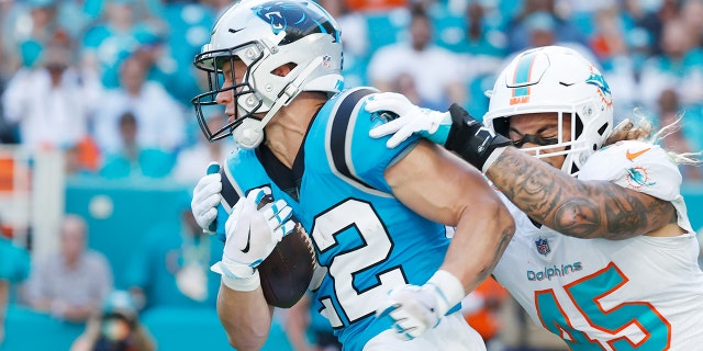 Christian McCaffrey (22) of the Carolina Panthers during a game against the Miami Dolphins at Hard Rock Stadium Nov. 28, 2021, in Miami Gardens, Fla.