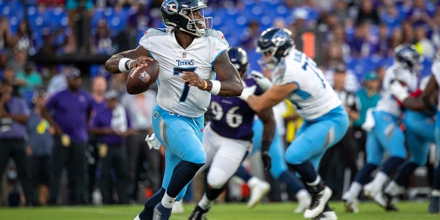 Tennessee Titans quarterback #7 Malik Willis scrambles out of his pocket and throws down the field during the NFL preseason game between the Tennessee Titans and the Baltimore Ravens at M&T Bank Stadium in Baltimore on August 11, 2022. to make 