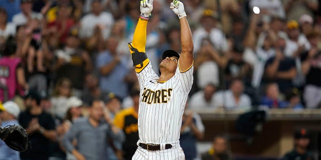 San Diego Padres' Juan Soto gestures after hitting a home run against the San Francisco Giants during the fourth inning of a baseball game, Tuesday, Aug. 9, 2022, in San Diego.
