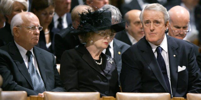 FILE - Former Soviet leader Mikhail Gorbachev, left, former British Prime Minister Margaret Thatcher and former Canadian Prime Minister Brian Mulroney attend the state funeral for former US President Ronald Reagan at Washington National Cathedral in Washington, DC