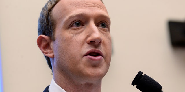 Facebook Chairman and CEO Mark Zuckerberg testifies at a House Financial Services Committee hearing.