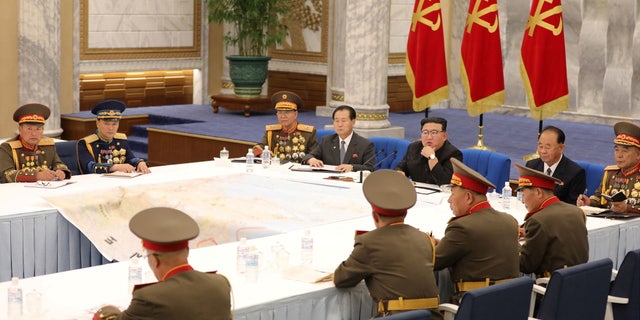 North Korean leader Kim Jong Un attends a convocation of the Expansion of the Central Military Commission of the Workers' Party of Korea in this photo released by the country's Korean Central News Agency (KCNA) on June 23. 2022.