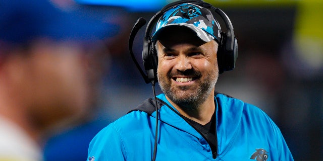 Carolina Panthers head coach Matt Rhule smiles during the first half of a preseason game against the Buffalo Bills on August 26, 2022 in Charlotte, NC