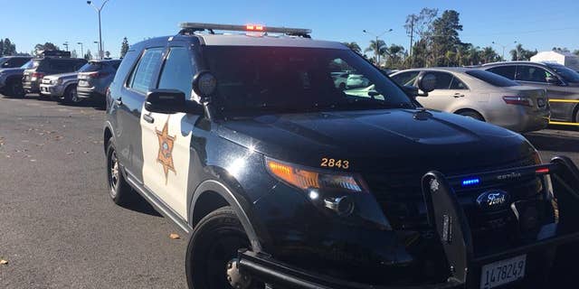 The sheriff's department is in the process of firing the suspect.