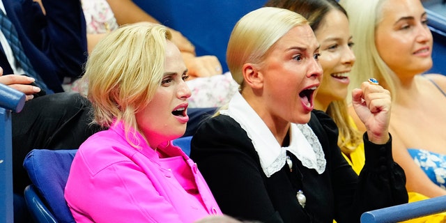 Australian-born star Rebel Wilson was spotted cheering enthusiastically with girlfriend Ramona Agulma at the US Open.