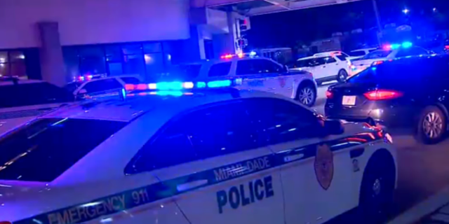 Authorities shut down I-95 to get the injured Miami-Dade officer to Jackson Memorial Hospital.