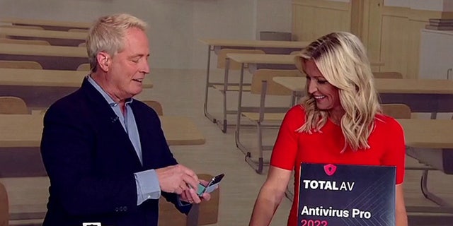 CyberGuy Kurt Knutsson shows the Samsung Galaxy Z Flip4 smartphone powered on "Fox and friends" Tuesday 16 August 2022.