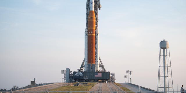 NASA's Space Launch System rocket and Orion spacecraft for the Artemis I mission are parked on the launch pad.