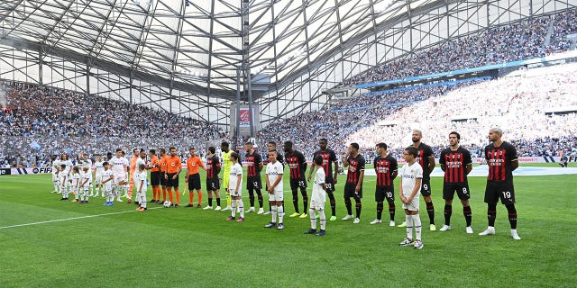 Two Line Teams during the Friendly match between Marseille and Milan AC at Orange Velodrome on July 31, 2022 in Marseille, France.