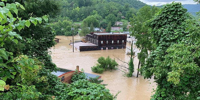 Flooding in Whitesburg, Kentucky, caused extensive damage to the Appalshop cultural center, a repository of Appalachian history and culture.
