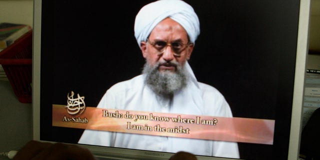 FILE - As seen on a computer screen from a DVD prepared by Al-Sahab production, al Qaeda leader Ayman Al Zawahri speaks in Islamabad, Pakistan, on June 20, 2006.