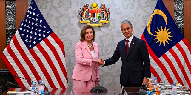 This handout photo taken and released by Malaysia’s Department of Information, U.S. House Speaker Nancy Pelosi, left, meets with Malaysia Parliament speaker Azhar Azizan Harun at the parliament house in Kuala Lumpur, Tuesday, Aug. 2, 2022.