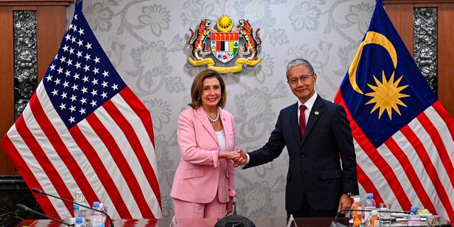 This handout photo taken and released by Malaysia’s Department of Information, U.S. House Speaker Nancy Pelosi, left, meets with Malaysia Parliament speaker Azhar Azizan Harun at the parliament house in Kuala Lumpur, Tuesday, Aug. 2, 2022.