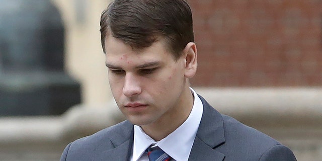 Nathan Carman arrives at federal court in Providence, Rhode Island. Carman was charged with killing his mother at sea during a 2016 fishing trip off the coast of New England. He will remain detained until his trial.