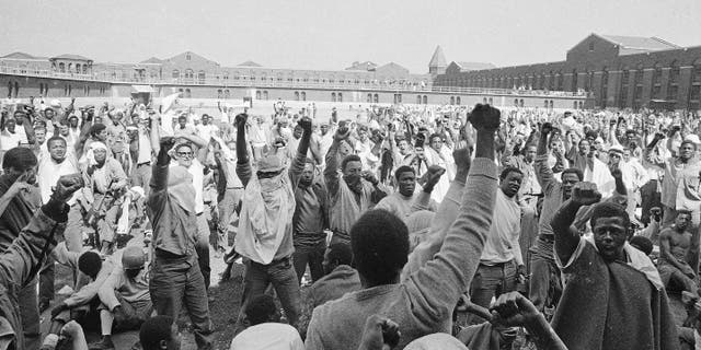Inmates at Attica State Prison in Attica, New York, raise their hands in a show of unity during the Attica uprising, which took the lives of 43 people. New York authorities have lifted a ban that had stopped state prison inmates from reading a book about the 1971 Attica Correctional Facility uprising following a First Amendment lawsuit brought by its author.