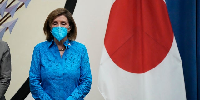 House Speaker Nancy Pelosi listens during a news conference at the U.S. Embassy in Tokyo, Friday, Aug. 5, 2022.