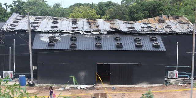 Exterior damage from a fire is seen at the Mountain B pub in the Sattahip district of Chonburi province in Thailand.