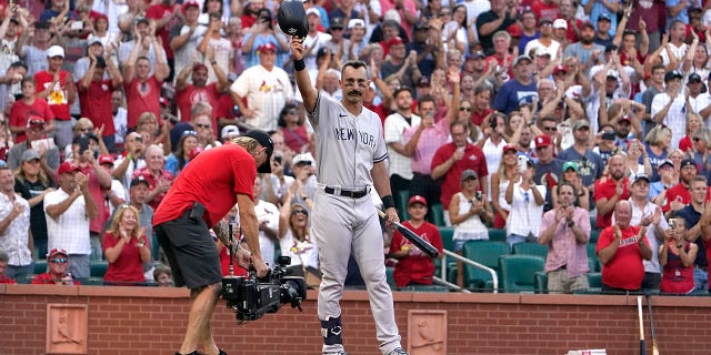 The New York Yankees' Matt Carpenter tips his cap as he steps up to bat during the first inning against the St. Louis Cardinals Friday, Aug. 5, 2022, in St. Louis.