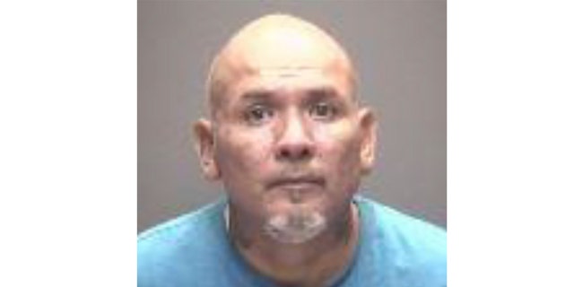 This booking photo provided by the Galveston Police Department on Sunday, Aug. 7, shows Miguel Espinoza