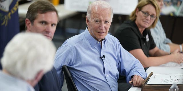 President Joe Biden participates in a briefing at Marie Roberts Elementary School about the ongoing response efforts to devastating flooding, Monday, Aug. 8, 2022, in Lost Creek, Ky. From left are Rep. Hal Rogers, R-Ky., Kentucky Gov. Andy Beshear, Biden, FEMA Administrator Deanne Criswell and Kentucky Lt. Gov. Jacqueline Coleman. (AP Photo/Evan Vucci)