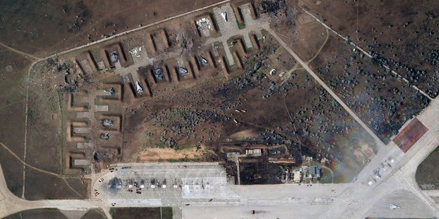 This satellite image provided by Planet Labs PBC shows a destroyed Russian aircraft on Tuesday, August 9, 2022, after it exploded at Saki Air Base in Crimea, which Russia had seized from Ukraine and annexed in March 2014. is shown. 