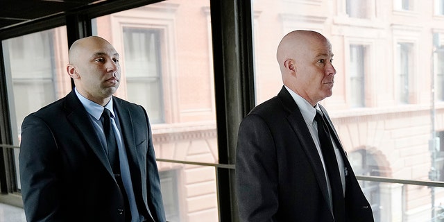 Former Minneapolis police officer J. Alexander Kueng, left, and his attorney Thomas Plunkett arrive for sentencing for violating George Floyd's civil rights outside the Federal Courthouse Wednesday, July 27, 2022, in St. Paul, Minn. 