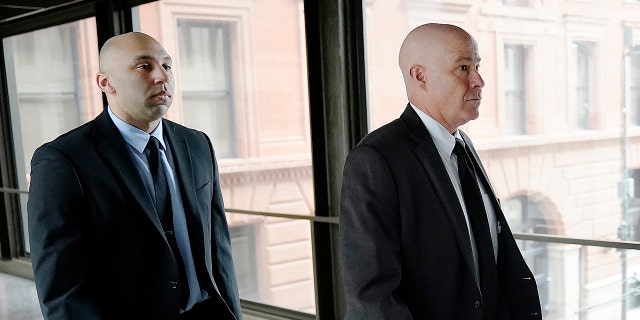 Former Minneapolis police officer J. Alexander Kueng, left, and his attorney Thomas Plunkett arrive for sentencing for violating George Floyd's civil rights outside the Federal Courthouse Wednesday, July 27, 2022, in St. Paul, Minn. 