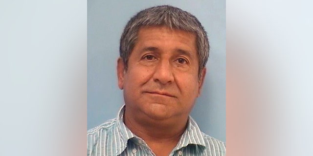 This photo released Tuesday, Aug. 9, 2022, by the Albuquerque Police Department shows Muhammad Syed, 51, who was taken into custody Monday, Aug. 8, 2022, in connection with the killings of four Muslim men in Albuquerque. 