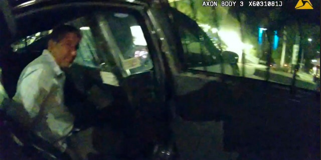 This Aug. 9, 2020, still image taken from officer video provided by the Albuquerque Police Department shows the arrest of Muhammad Syed. 