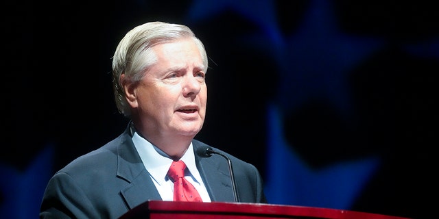 FILE - Sen. Lindsey Graham, R-S.C., addresses a South Carolina GOP dinner July 29, 2022, in Columbia, S.C. Graham has brought on former President Donald Trump's former White House counsel Don McGahn, who was in federal court in Atlanta last week as part of a legal team fighting a subpoena for Graham