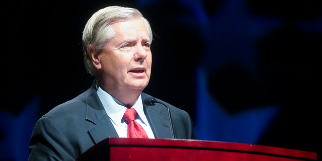FILE - Sen. Lindsey Graham, R-S.C., addresses a South Carolina GOP dinner July 29, 2022, in Columbia, S.C. Graham has brought on former President Donald Trump's former White House counsel Don McGahn, who was in federal court in Atlanta last week as part of a legal team fighting a subpoena for Graham