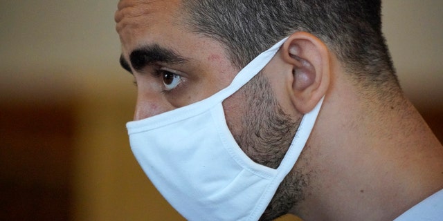 Hadi Matar, 24, listens while being arraigned in the Chautauqua County Courthouse in Mayville, N.Y.