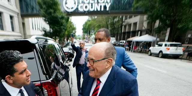 Rudy Giuliani arrives at the Fulton County Courthouse on Aug. 17, 2022, in Atlanta to testify before a special grand jury investigating former President Donald Trump's efforts to overturn the 2020 election results in Georgia.