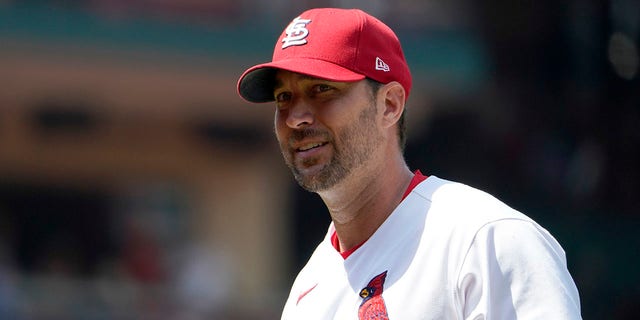 St. Louis Cardinals starting pitcher Adam Wainwright walks off the field after working the seventh inning of a baseball game against the Colorado Rockies, Thursday, Aug. 18, 2022, in St. Louis. 
