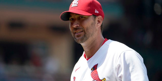 St. Louis Cardinals starting pitcher Adam Wainwright walks off the field after working the seventh inning of a baseball game against the Colorado Rockies, Thursday, Aug. 18, 2022, in St. Louis.