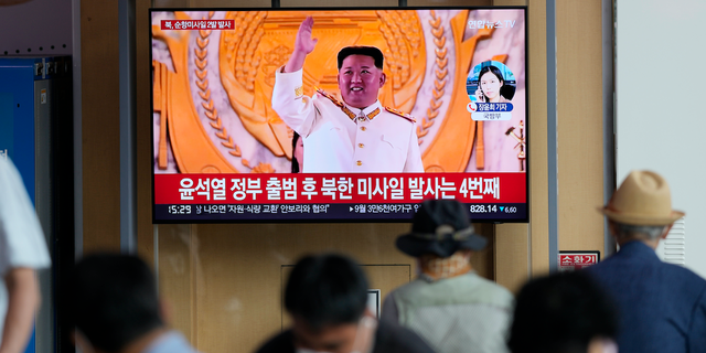 FILE - A TV screen showing a news program reporting about North Korea's missile launch with a file footage of North Korean leader Kim Jong Un, is seen at the Seoul Railway Station in Seoul, South Korea, Wednesday, Aug. 17, 2022.  (AP Photo/Lee Jin-man, File)