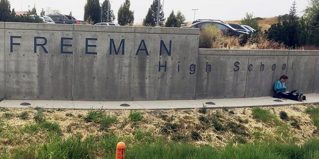 The sign for Freeman High School in Rockford, Wash., is seen outside the campus on Sept. 13, 2017. 
