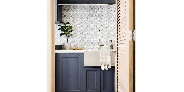 Hillary Stamm, an interior designer at HMS Interior Design in El Segundo, California, likes to use wallpaper, textured tiles and colorful patterns in laundry rooms.