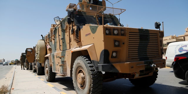 Libyan forces are deployed in Tripoli, Libya, Saturday, Aug. 27, 2022. Clashes broke out early Saturday between rival militias in Libya's capital, a health official said.