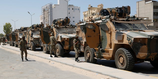 Libyan forces are deployed in Tripoli, Libya, Saturday, Aug. 27, 2022.