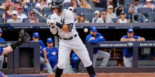 New York Yankees' Aaron Judge is hit by a pitch during the fifth inning against the Toronto Blue Jays on Aug. 21, 2022, in New York.