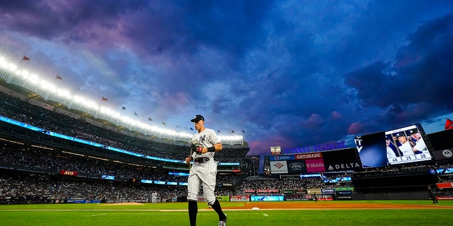 New York Yankees' Aaron Judge heads to the dugout during the second inning of a baseball game against the New York Mets Tuesday, Aug. 23, 2022, in New York.