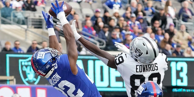 Las Vegas Raiders wide receiver Bryan Edwards, right, can't catch a pass in the end zone as New York Giants cornerback Adoree 'Jackson defends at MetLife Stadium, Nov. 7, 2021, in East Rutherford, New Jersey.