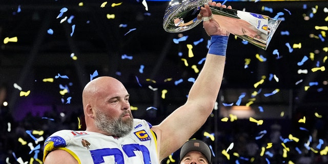 Andrew Whitworth of the Los Angeles Rams holds the Lombardi Trophy after the Rams defeated the Cincinnati Bengals in the Super Bowl Levi's at SoFi Stadium in Englewood, California, on February 13, 2022.