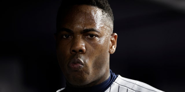 New York Yankees pitcher Aroldis Chapman is shown in the dugout during the ninth inning against the Toronto Blue Jays in New York on Aug. 19, 2022.