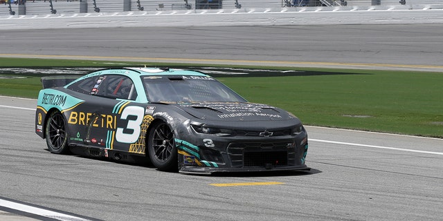 Austin Dillon slides backward through pit road after a multi-car crash during the Coke Zero Sugar 400 at Daytona International Speedway in Daytona Beach, Florida, on Aug. 28, 2022.